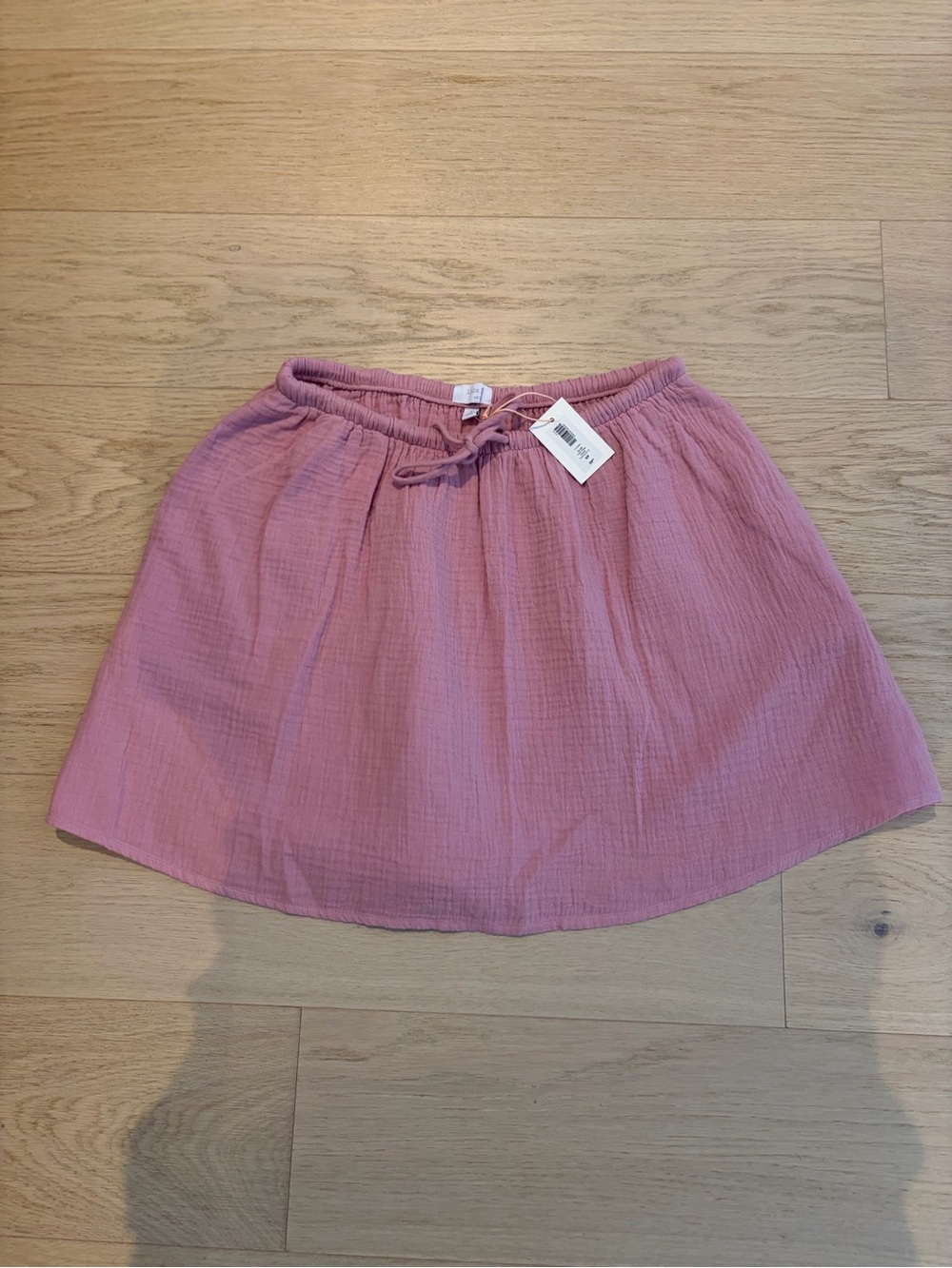 Aritzia little moon Women’s Pink Drawstring Skirt with pockets.